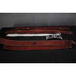 A collection of vintage leather belts, some with embossed designs. L.115cm. (largest)