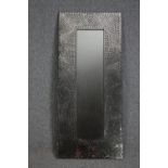 A contemporary wall mirror in mosaic glass frame. H.123 W.53cm.