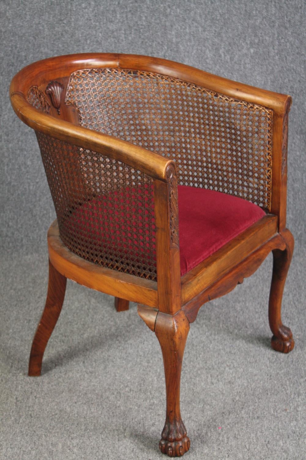 A mid century walnut George I style tub chair with bergere caned back and sides. H.88 W.56cm. - Image 2 of 5