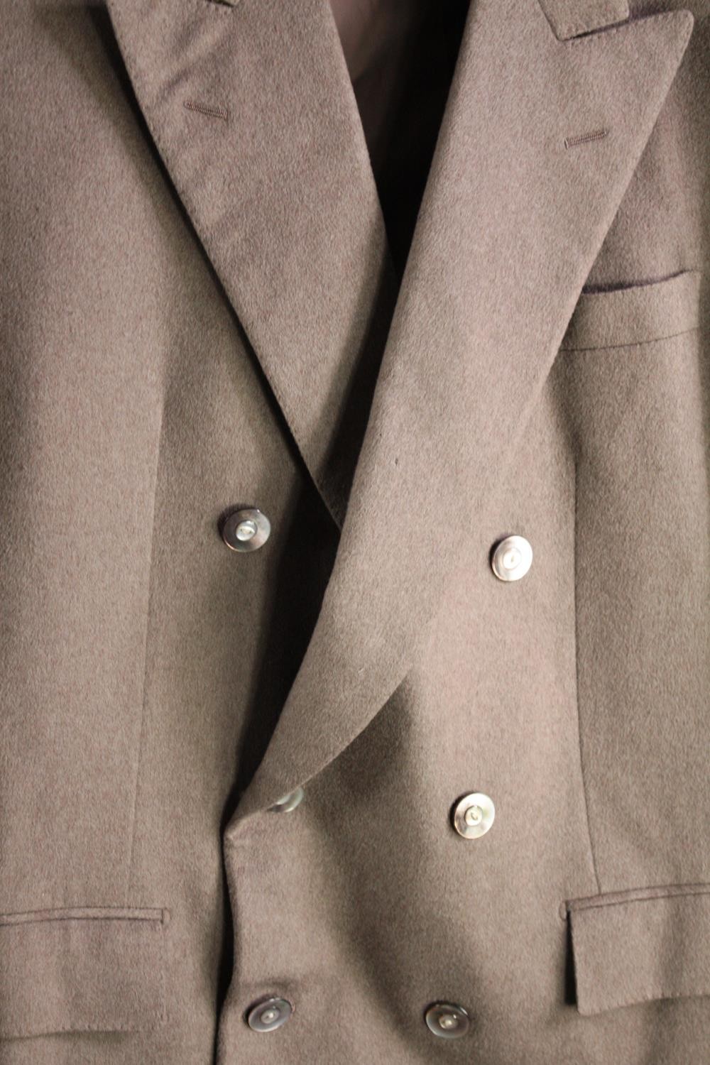 A bespoke made beige suit jacket with mother of pearl buttons. Saint Laurent label. - Image 2 of 6