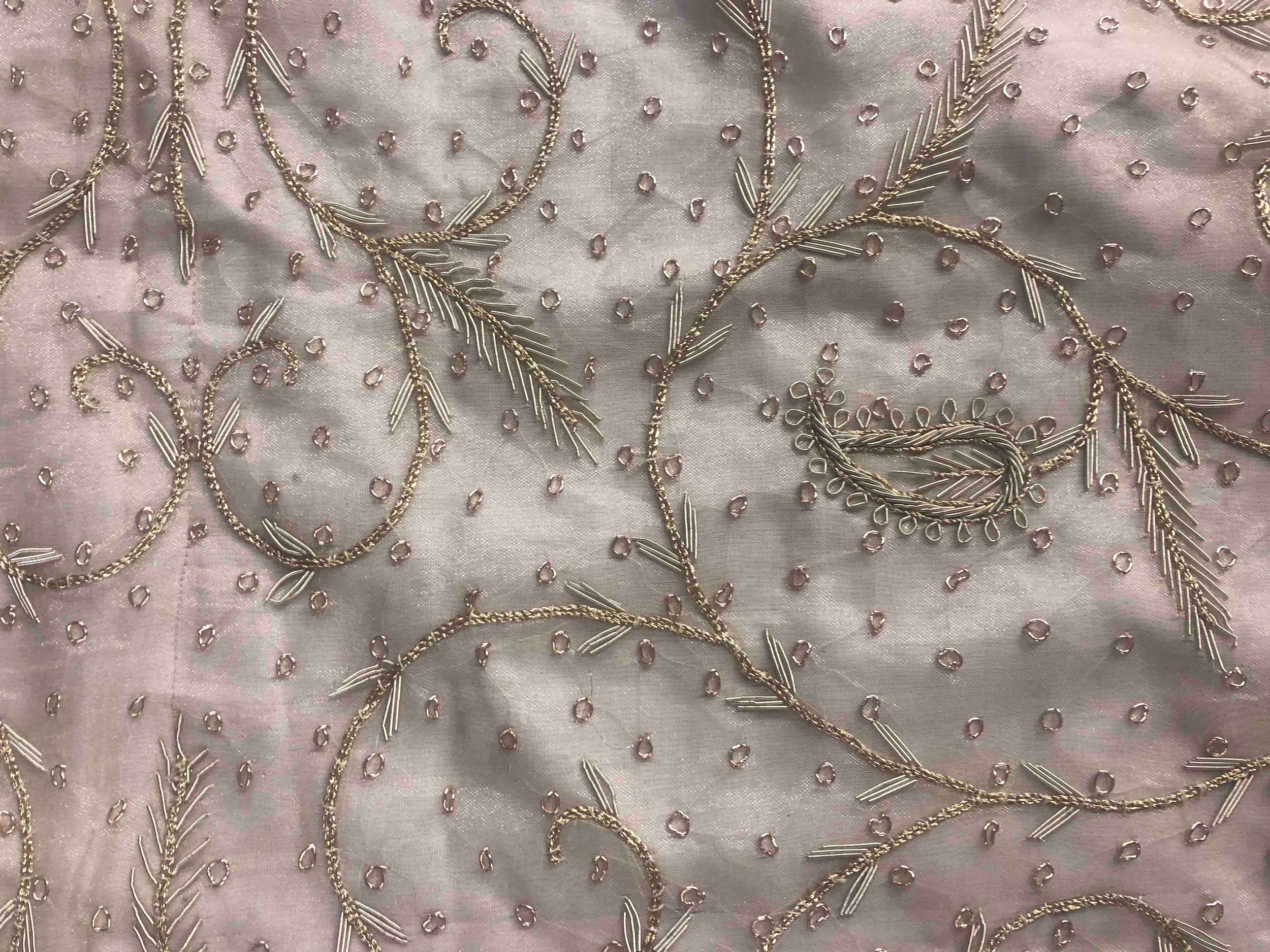 An Indian embroidered cotton bedspread. Decorated with with a intricate floral pattern L.262 W. - Image 6 of 7