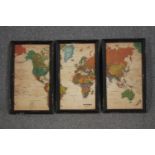 A map of the world framed in three parts. Post war. Framed and glazed. H.60 W.35 cm.