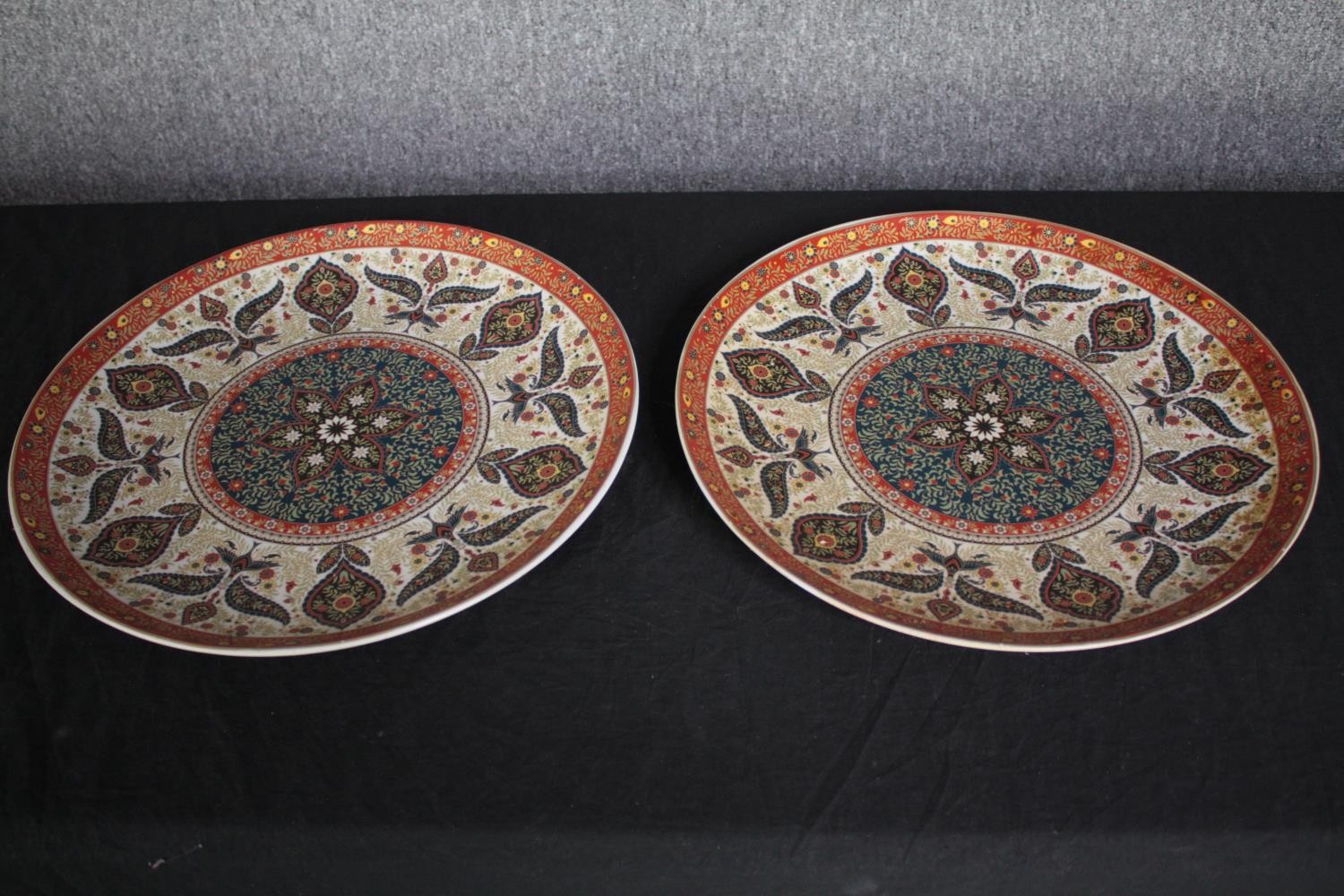 A pair of large vintage hand decorated Chinese plates. Dia.41cm. (each)