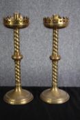A pair of Gothic style brass candle holders with twist stems. H.40cm. (each)