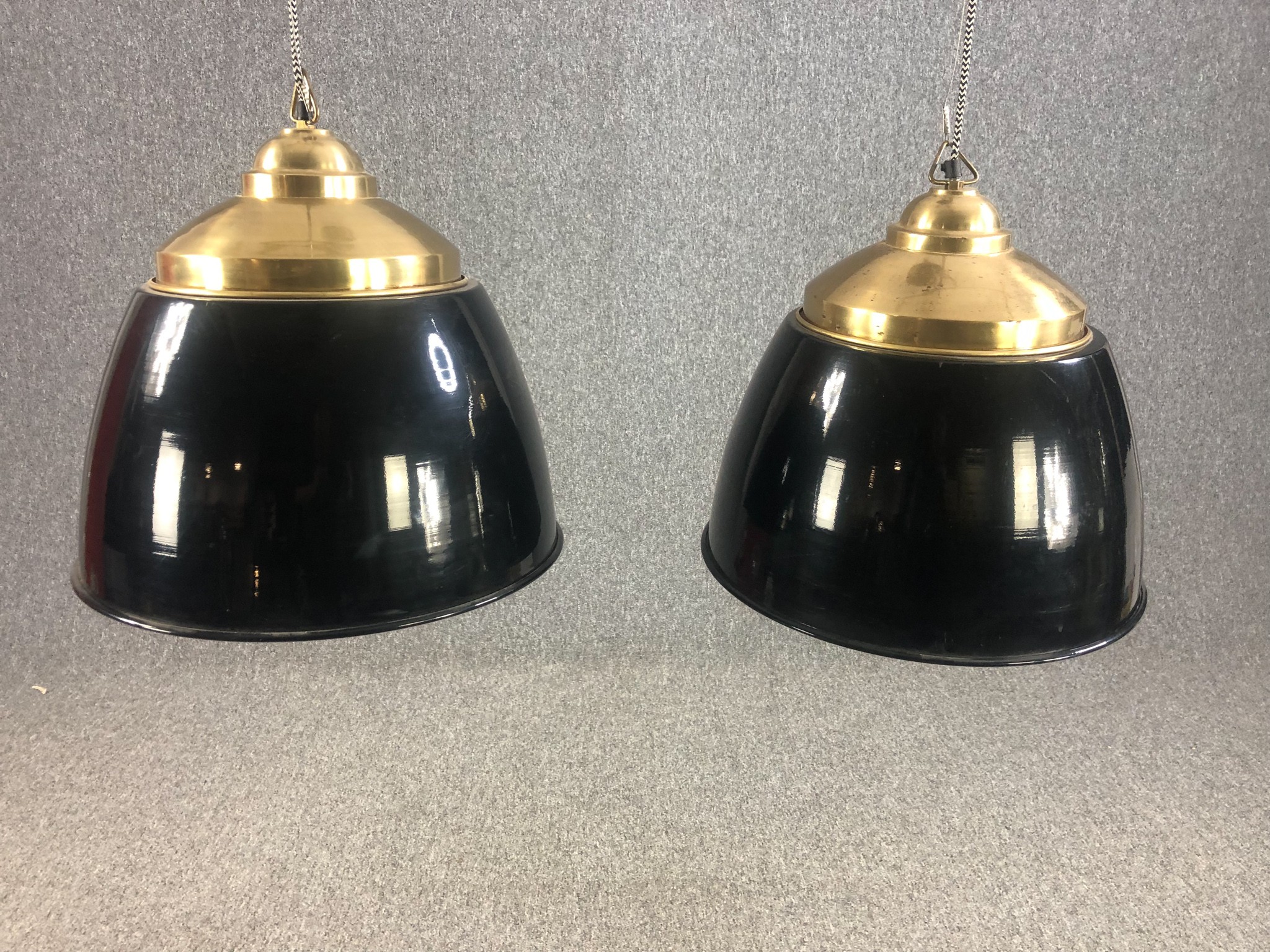 A pair of ceiling mounted down lights with enamelled shades and brass fittings. H.40 Dia.43cm.(each)
