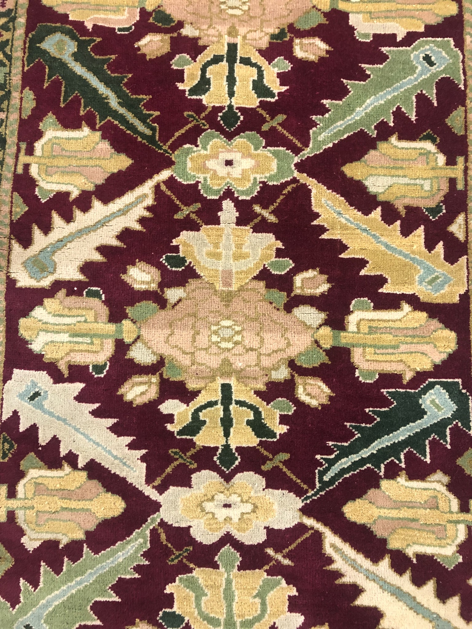 A Shirvan runner with repeating palmette and serrated palm motifs on a claret ground within - Image 2 of 4