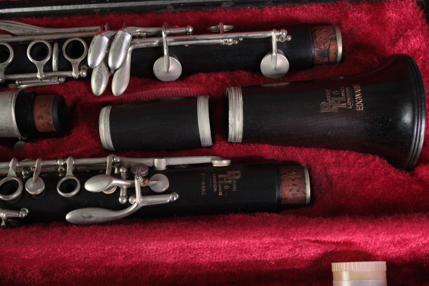 A Boosey and Hawkes clarinet. Complete and in its original felt lined case. L.35 W.23 cm. - Image 3 of 4