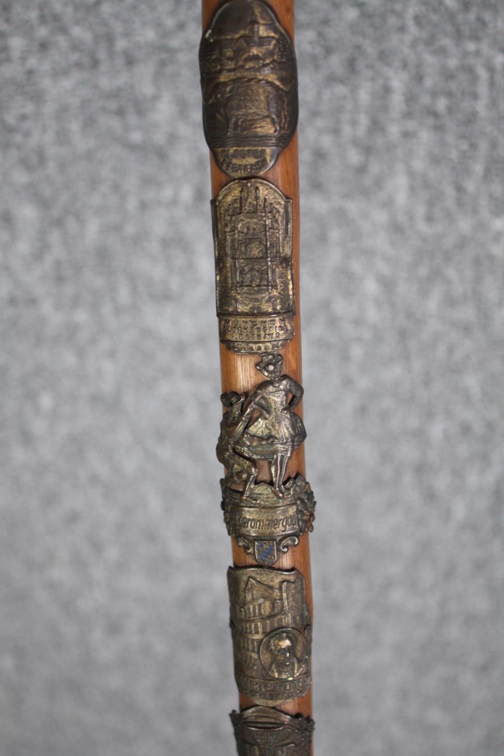 A pair of walking canes. The smaller one with a bone and silver handle the other, German and - Image 7 of 7