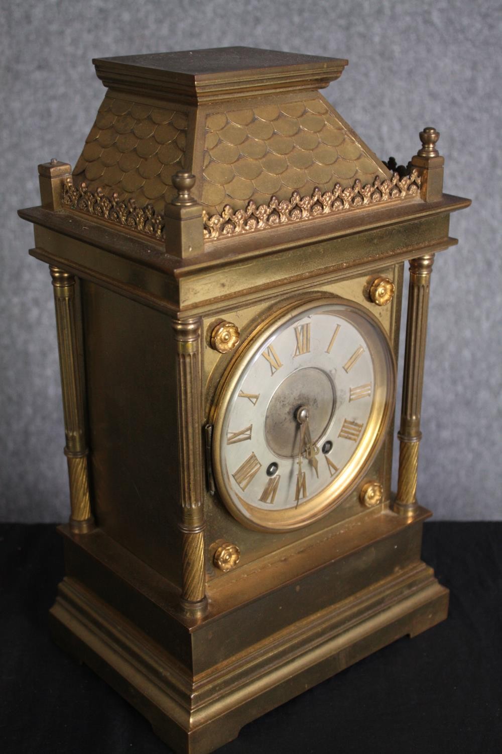 A 19th century brass architectural design mantle clock with tile detailing to the roof. Silvered - Image 2 of 6