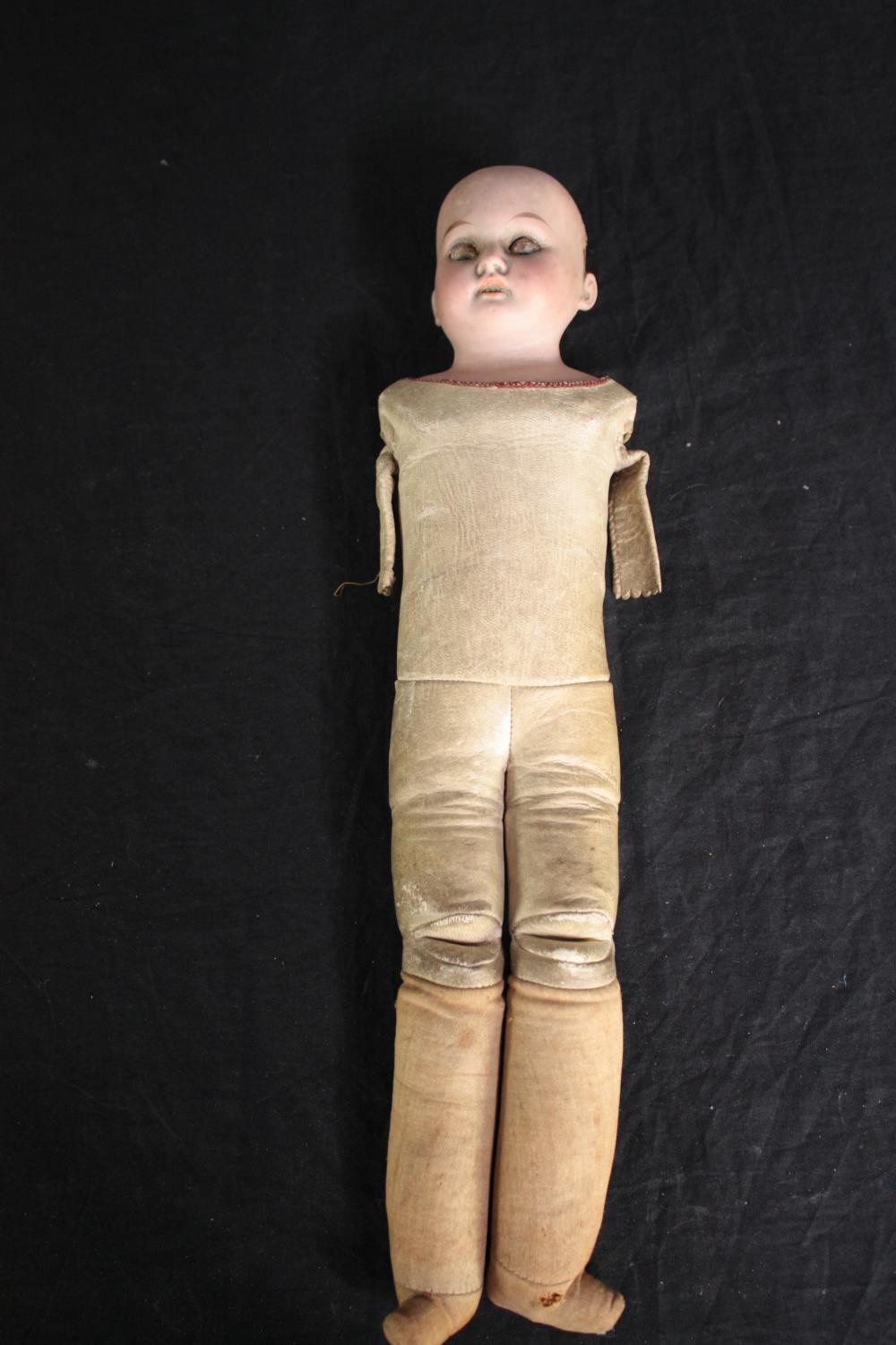 A collection of three dolls. With glass eyes. Two incomplete and missing arms. L.37cm. (largest) - Image 7 of 13