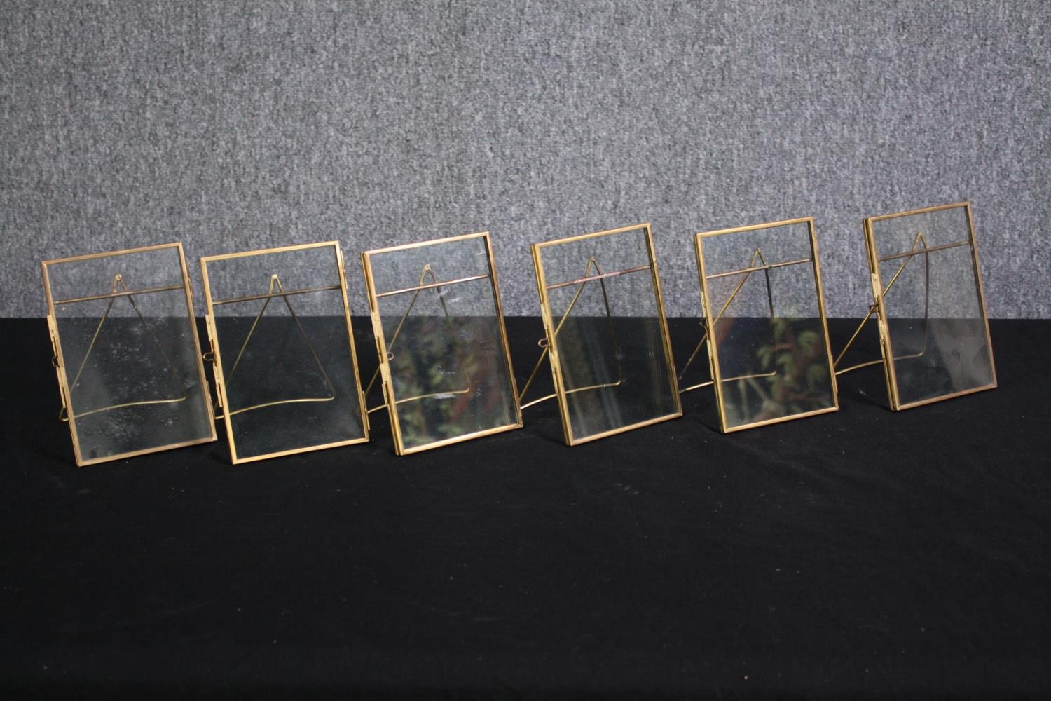 Six gold metal easel picture frames. H16 W.11cm. (each)