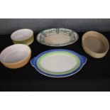 A collection of bowls and serving plates made by Pearson of Chester, Gray's Pottery and others. L.39