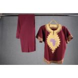 A bespoke vintage African inspired maroon velvet top with outline of Africa embellished and