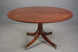 Dining or breakfast table, early 19th century style mahogany with ebony string inlay and tilt top