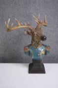 A decorative stags bust in military uniform. H.52 W.42cm.