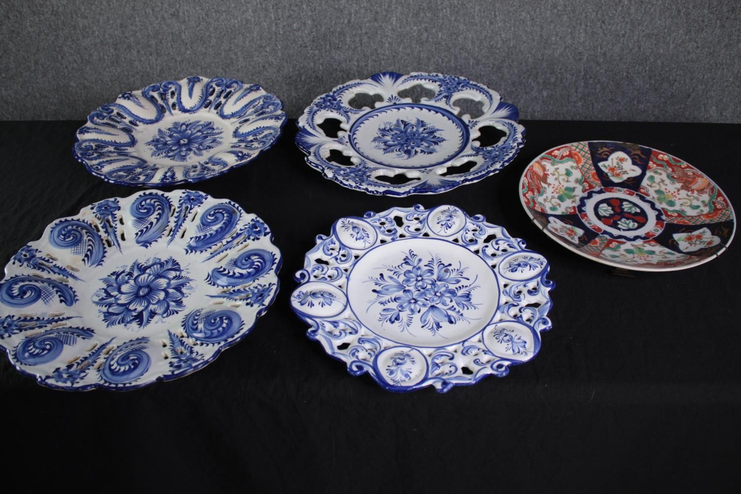 Five large decorative plates. Hand coloured with 'Portugal 483' written on the base. Dia.37 cm. (