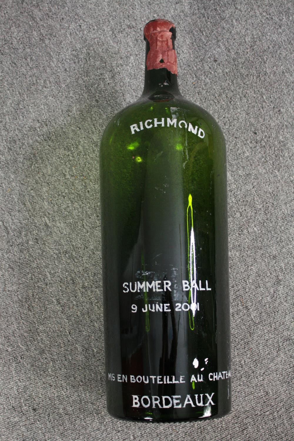 A large oversized wine bottle. Bouteille chateau, Bordeaux. Richmond Summer Ball 2001. H.63cm.