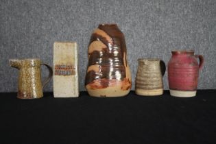 A mixed collection of pottery. Three jugs and two pots. Signed 'O.E.F' and Stephen Llewellyn Pottery