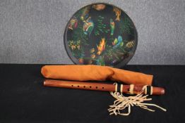 A Remo Ocean drum and ethnic flute. L.68cm.(largest)