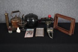 A miscellany of kitchen ware to include a Belgium chocolate mould, a Turkish brass coffee grinder (