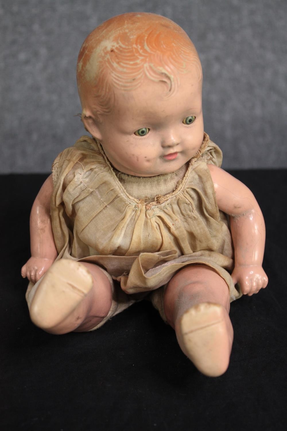 A collection of three dolls. With glass eyes. Two incomplete and missing arms. L.37cm. (largest) - Image 2 of 13