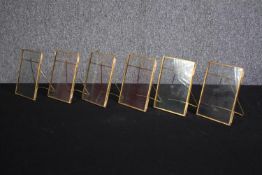 Six gilt metal easel picture frames. H16 W.11cm. (each)