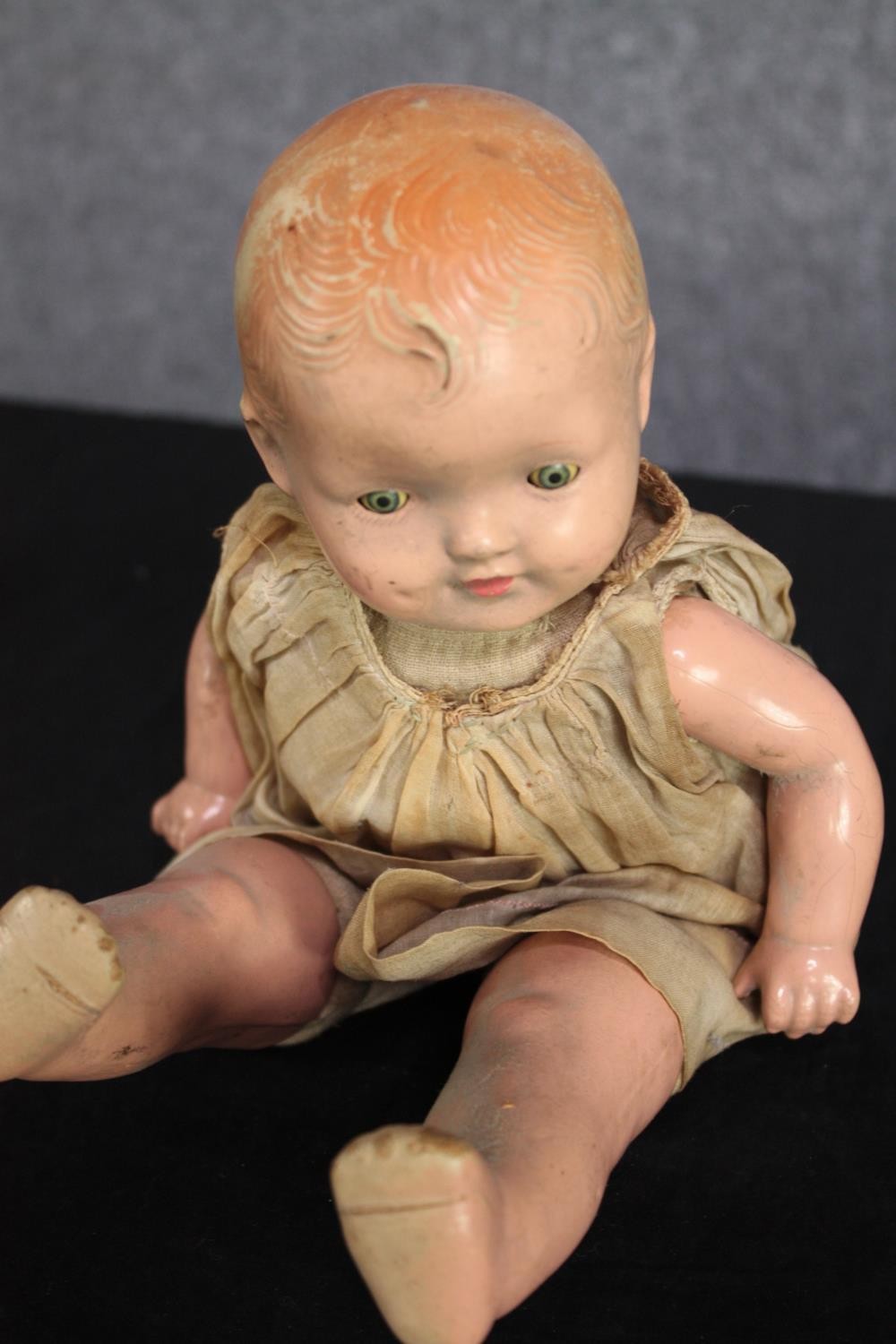 A collection of three dolls. With glass eyes. Two incomplete and missing arms. L.37cm. (largest) - Image 4 of 13