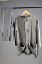 A bespoke made vintage grey tone pin stripe and block design two piece suit with mother of pearl