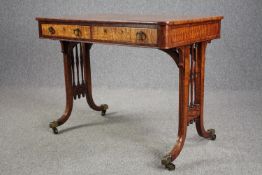 A Regency mahogany and sabicu writing table, frieze drawers opposing dummy drawers, probably Gillows