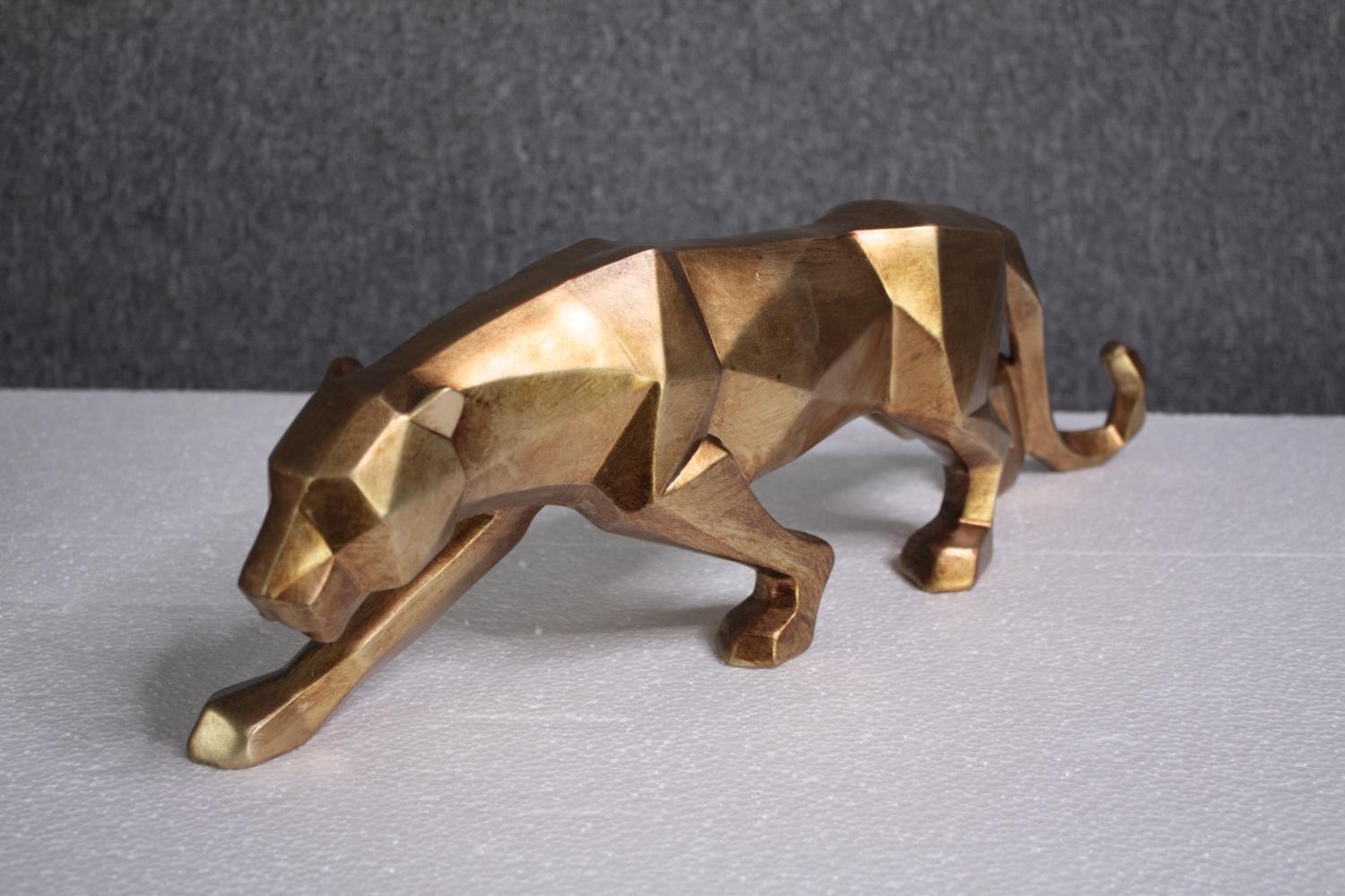 Four decorative wild cats. Moulded and finished in gold. H.14 W.47cm. (each) - Image 4 of 4