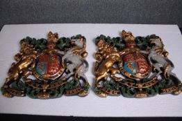 A matching pair of royal crests. moulded polychrome. H.37 W.30cm. (each)