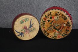 Two Chinese Tom-Tom drums featuring hand painted exotic birds Dia. 32cm.(largest)