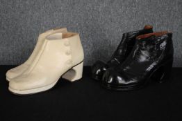 Two pairs of bespoke made platform high heels shoes. Size 9 in black and white leather.