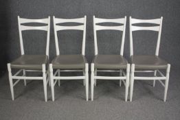 Dining chairs, a set of four mid century Danish style, white lacquered.