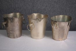 Three silver plated ice buckets with vines decorating the rims. H.21cm. (largest)