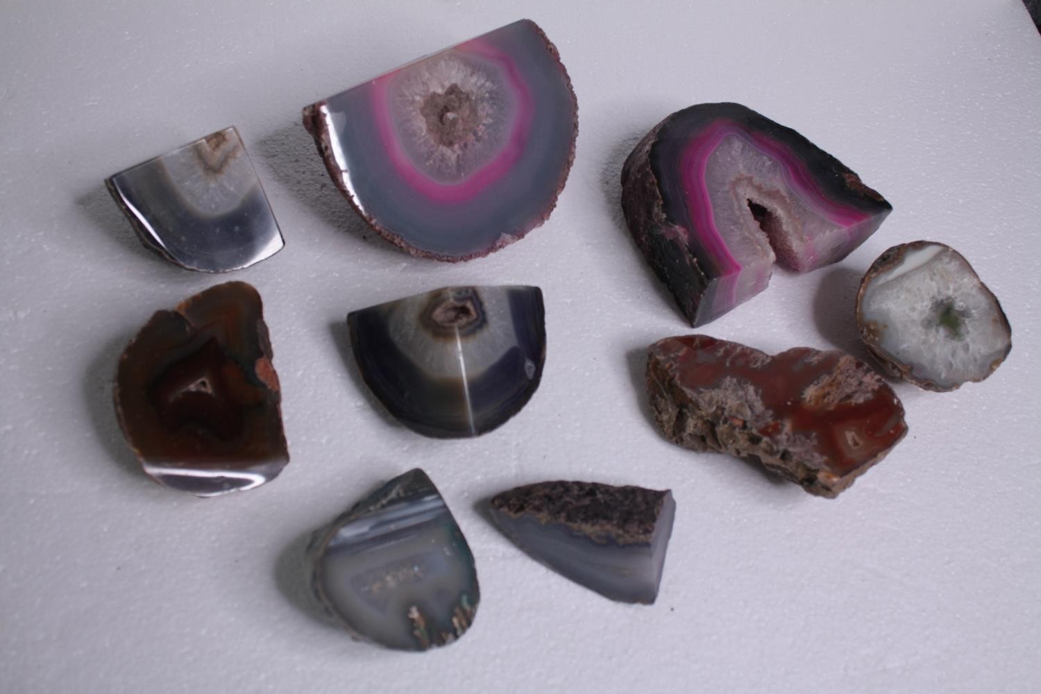 A collection of nine Agate geodes and slices, some dyed. H.14 W.8cm. (largest)