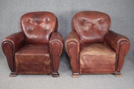 Armchairs, a pair mid century vintage in buttoned leather and studded upholstery. H.85 W.90cm. (