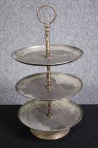 A three tier metal cake stand. H.43 Dia. 23cm.