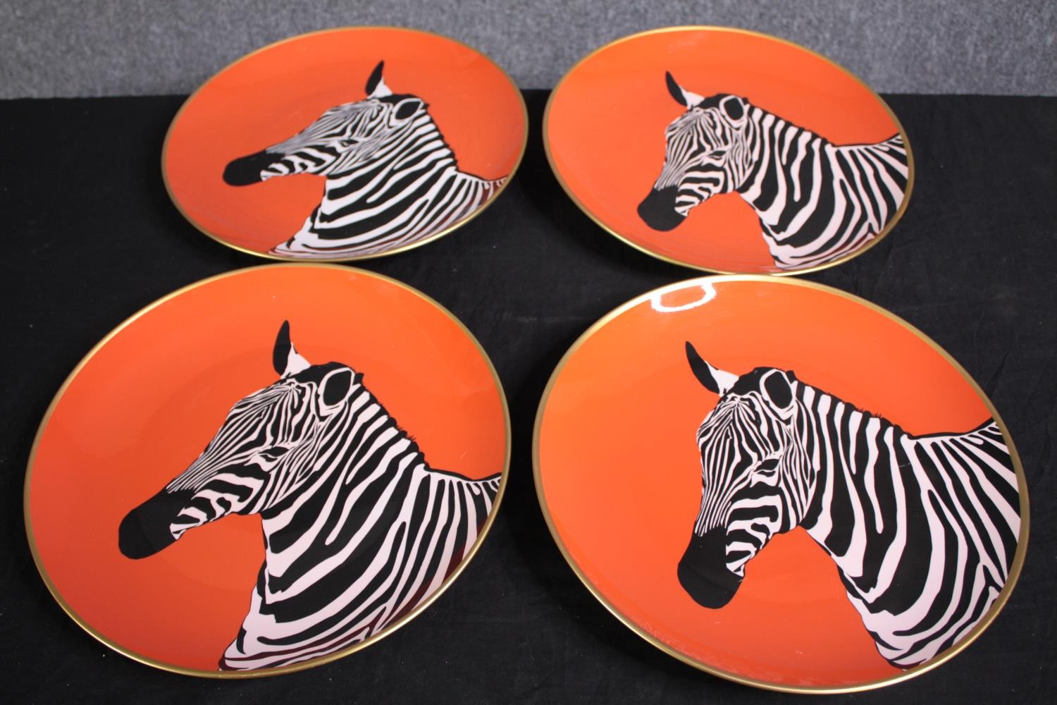 Four plates decorated with Zebras. Dia.30cm.(each)