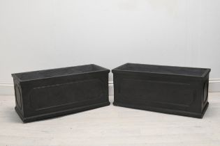 A pair of 19th century style faux lead planters, modern in fibreclay. H.30 W.80 D.29cm.