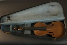 An early 20th century cased concert violin with Stradivarius label, dated 1722. H.7 W.40 D.30cm.