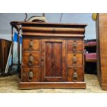An early 19th century flame mahogany dwarf side cabinet. H.74 W.74 D.42cm.