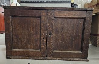 An antique oak table top stationery cabinet. H.46 W.74 D.44cm.