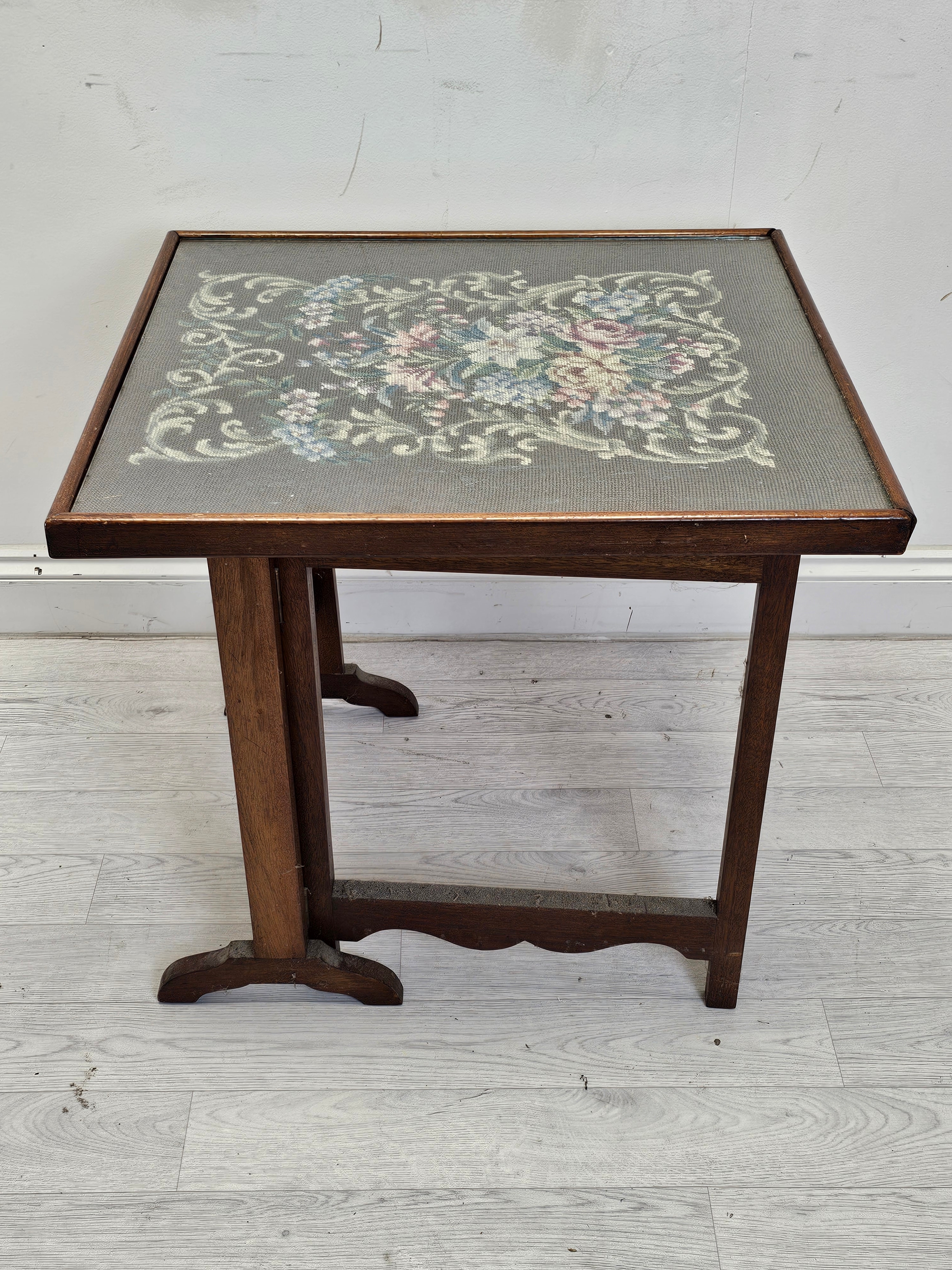 A mid century glazed tapestry fire guard in an oak frame converting to a gateleg occasional table. - Image 3 of 4