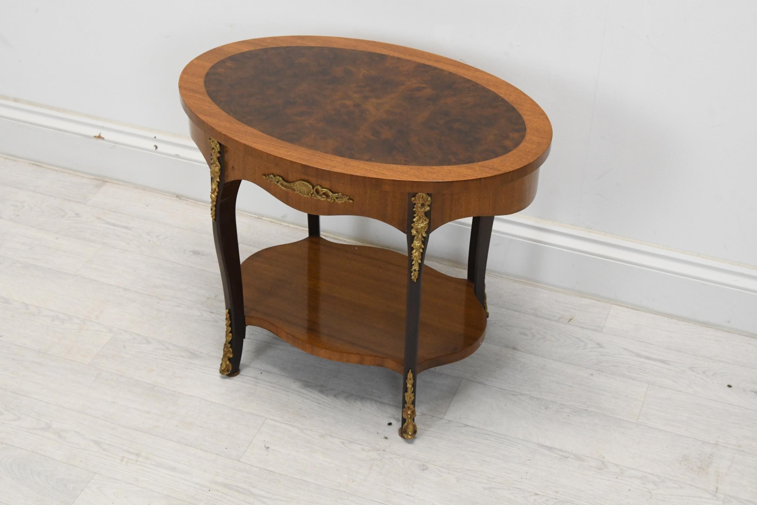 Lamp table, Louis XV style in burr walnut and crossbanded with ormolu mounts. H.47 W.58 D.37cm. - Image 2 of 3