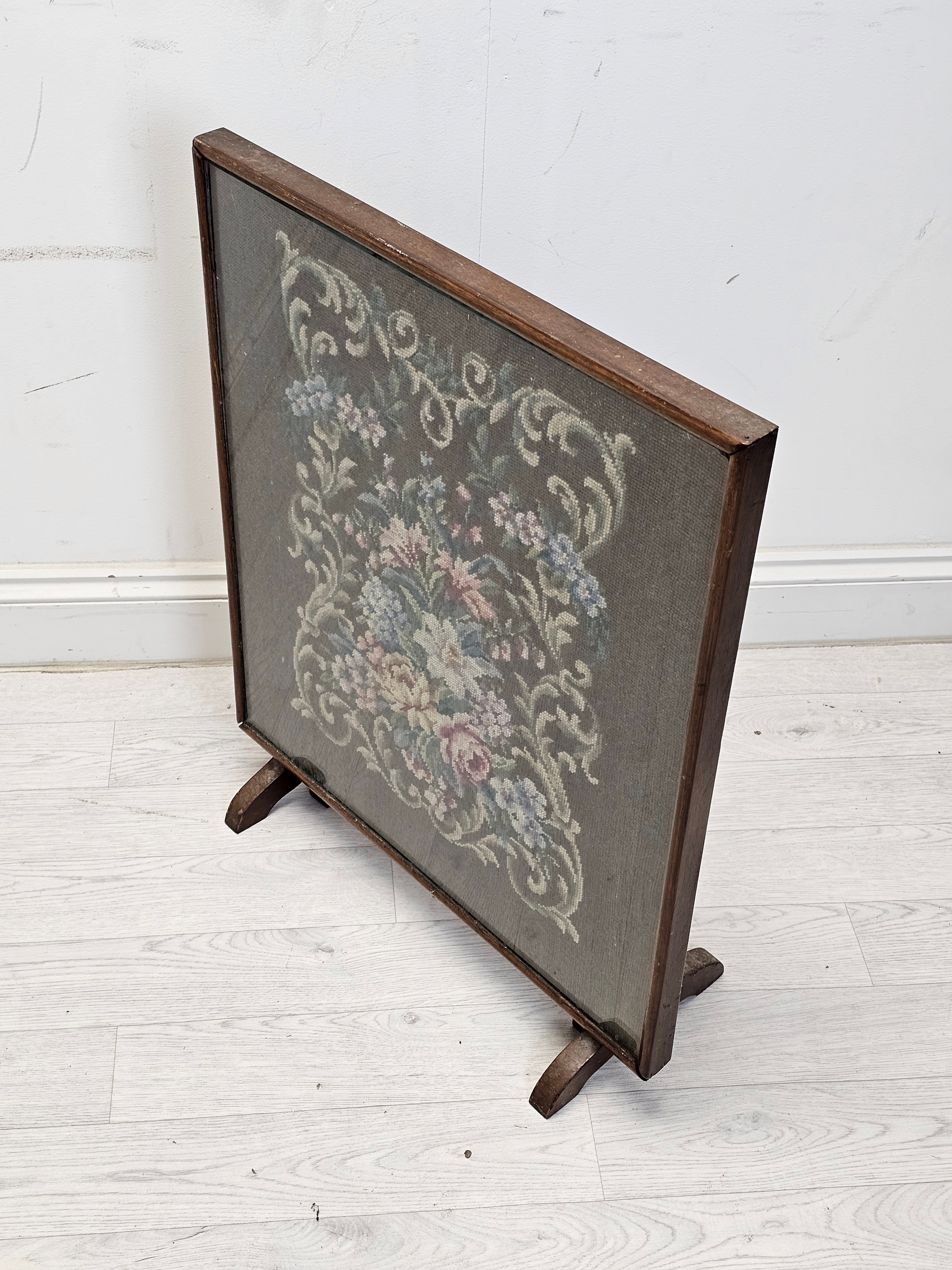 A mid century glazed tapestry fire guard in an oak frame converting to a gateleg occasional table. - Image 2 of 4