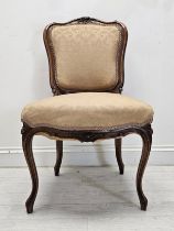 A carved oak Louis XV style side chair. H.85 W.48 D.48cm.