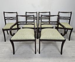 A set of six mahogany Regency style dining chairs.