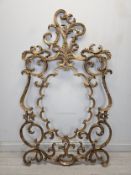 A large gilt metal Rococo style frame. H.157 W.88cm. (Old repair as seen in third photo).