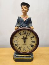 A contemporary moulded clockman type figure. H.46cm.